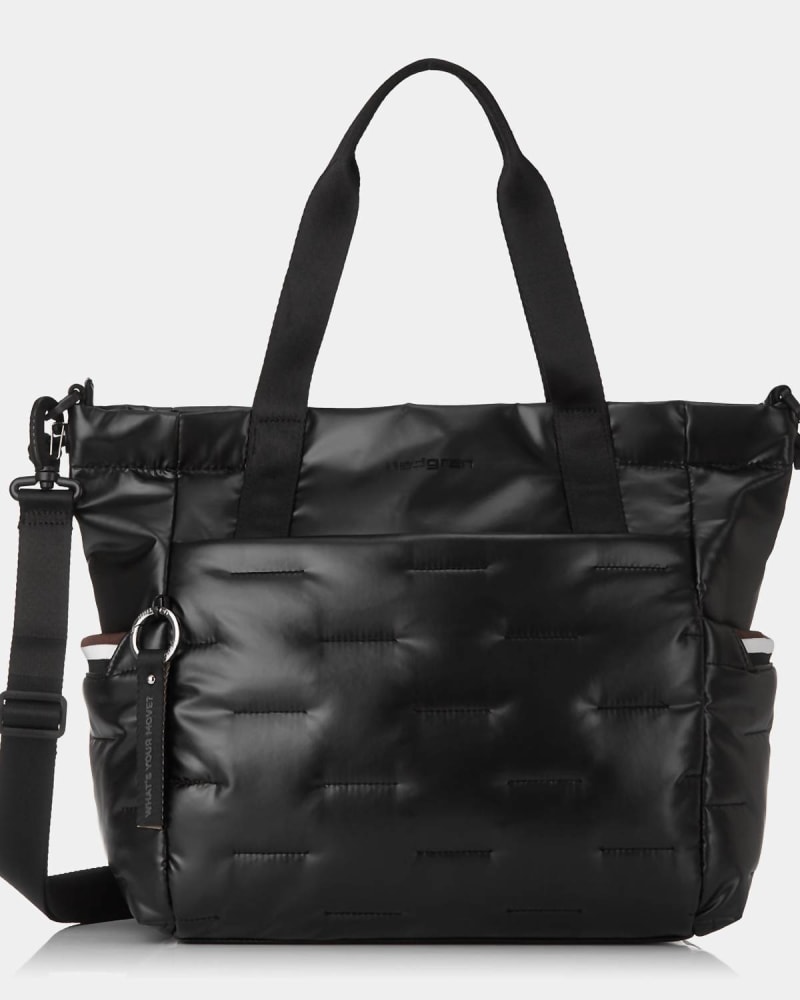 Front of a model wearing a size O/S Puffer Tote Bag In Black in Black by Hedgren. | dia_product_style_image_id:358391